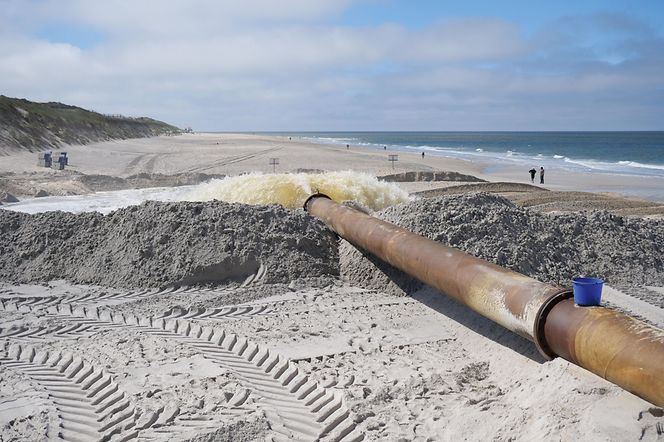 Aufspülen von Sand über Rohre Kopie