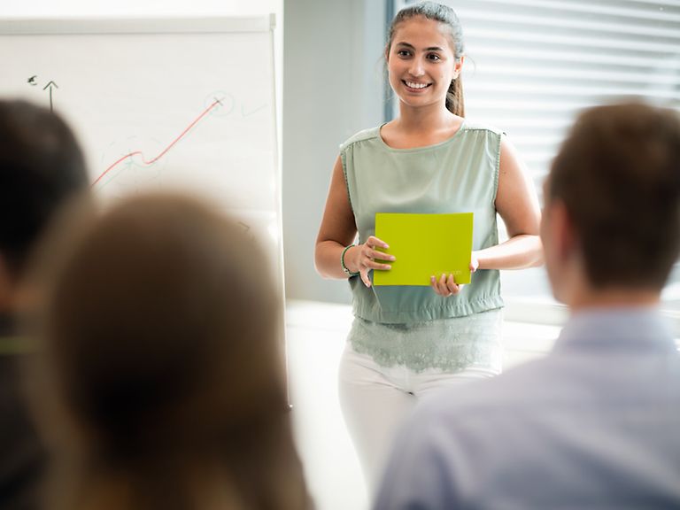 working-areas-image-finance Woman gives presentation