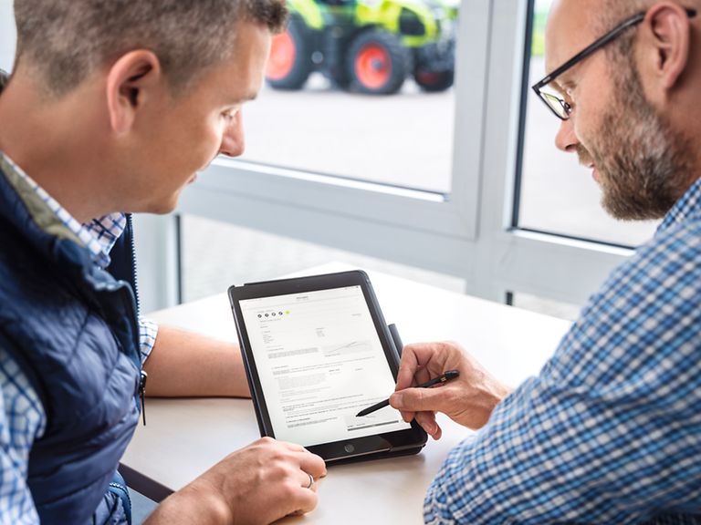 working-areas-image-it Men talking with tablet in their hands